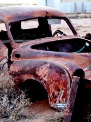 Photograph of rusted car