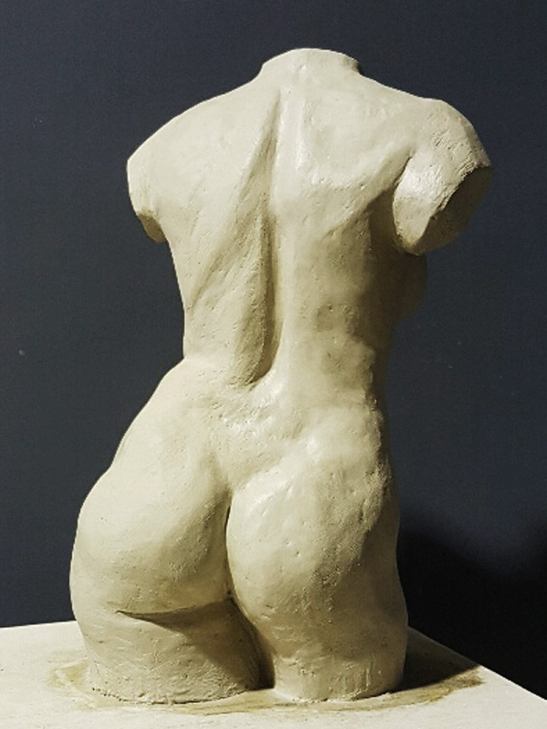 Torso sculpture of female body
